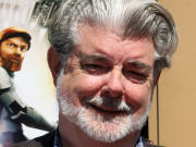Le producteur George Lucas � la premi�re du film Clone Wars, � Los Angeles