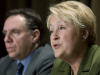 Pauline Marois et Fran�ois Legault, en arri�re-plan