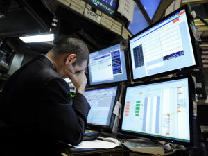 Un spécialiste à la bourse de New York, le New York Stock Exchange