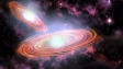 Deux trous noirs au centre d'une galaxie (impression artistique)