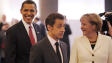 Le pr�sident am�ricain Barack Obama avec, en avant plan, son homologue fran�ais et la chanceli�re allemande.