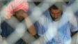 D�tenus � la prison d'Abou Ghraib, en juillet 2004.
