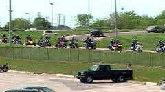 Manifestation de motocyclistes en marge du conseil général du PLQ, à Laval