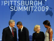 Les Obama reçoivent les Harper au sommet du G20 à Pittsburgh.