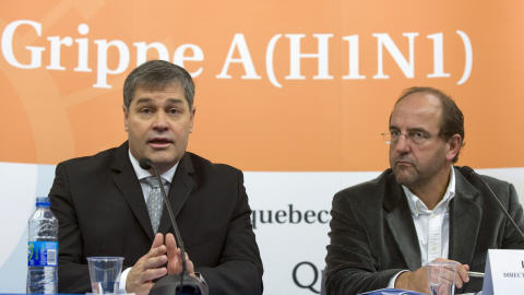 Le ministre de la Sant�, Yves Bolduc, et le directeur de la Sant� publique du Qu�bec, le Dr Alain Poirier