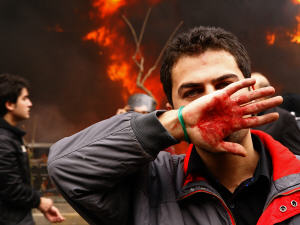 Un partisan de l'opposition lors des manifestations du 27 décembre.