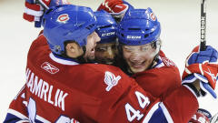 Roman Hamrlik, Tomas Plekanec et Sergei Kostitsyn