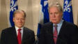 Jean Charest et Raymond Bachand commentent le budget f�d�ral.