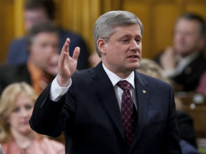 Le premier ministre Harper à la Chambre des communes, mardi.