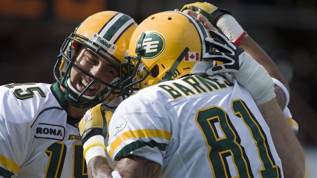 Ricky Ray et Jason Barnes