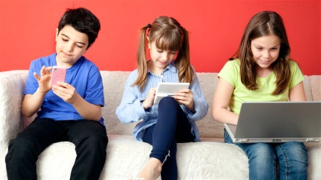 Des enfants adeptes de la technologie