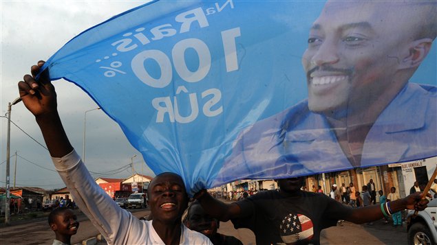 Des partisans de Joseph Kabila fêtent la réélection annoncée de leur favori.