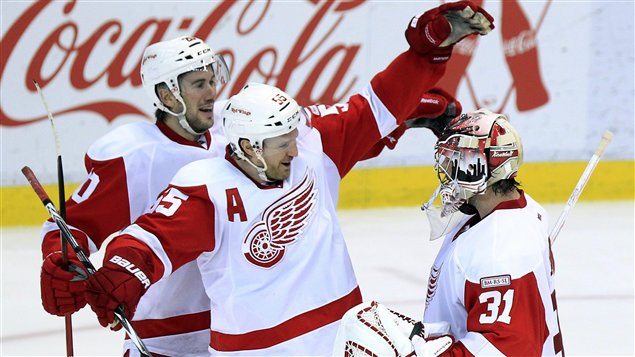 Le gardien Joey Macdonald, Niklas Kronwall et Drew Miller