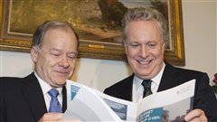 Le ministe des Finances du Québec, Raymond Bachand, et le premier ministre Jean Charest.
