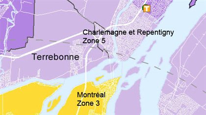 Charlemagne et Repentigny se trouvent en zone 5. Des usagers traversent en voiture pour prendre les transports en commun à Montréal, en zone 3.