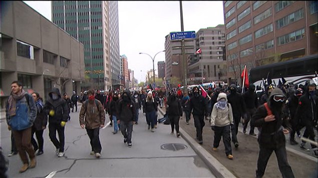 Des manifestants participant à la marche de la CLAC