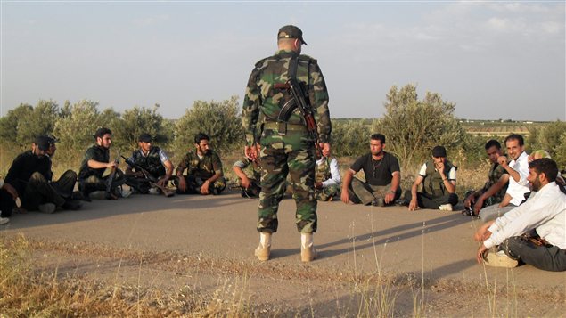 Des membres de l'Armée syrienne libre près de Homs