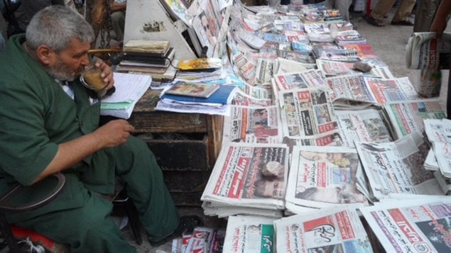 Am Ramadan, un vendeur de journaux de la place Tahrir