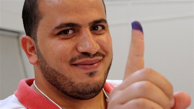 Abu-Bakr Gurman, Canadien d'origine libyenne après avoir voté à Ottawa, le 3 juillet 2012.