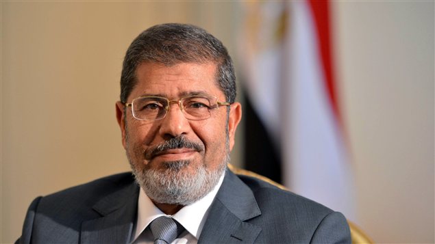 Le nouveau président égyptien Mohammed Morsi, photographié lors d'une rencontre avec le sous-secrétaire d'État américain, William Burns (qui ne figure pas sur la photo), le 8 juillet, au Caire