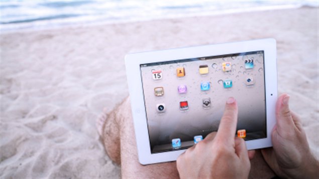 Une tablette sur la plage Une tablette sur la plage