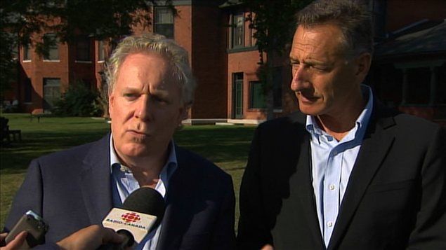 Jean Charest avec le gouverneur du Vermont, Peter Shumlin, à Burlington.