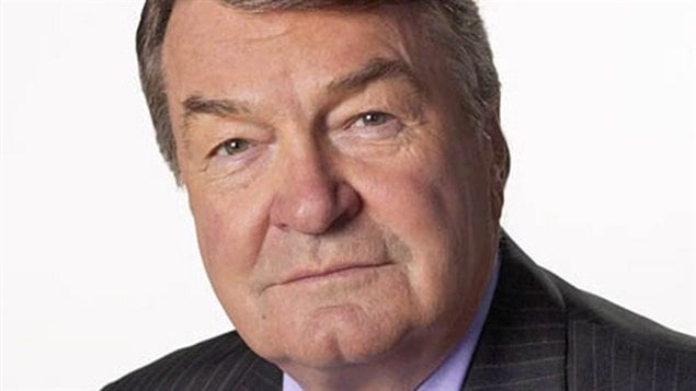 Le journaliste canadien Henry Champ.