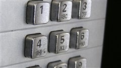 Le clavier d'un téléphone public