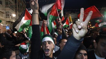 Des Palestiniens en liesse dans les rues de Ramallah.