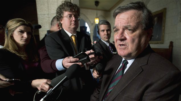 Le ministre des Finances Jim Flaherty à la sortie de la Chambre des communes à Ottawa le 3 décembre 2012. 