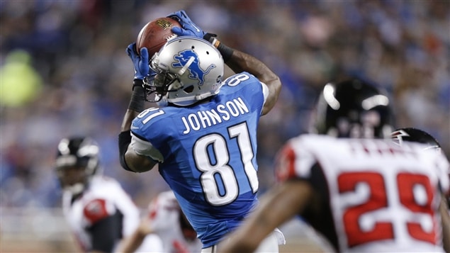 Le receveur éloigné Calvin Johnson