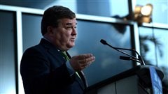Le ministre des Finances Jim Flaherty lors de la conférence de presse, le 1er mars 2013