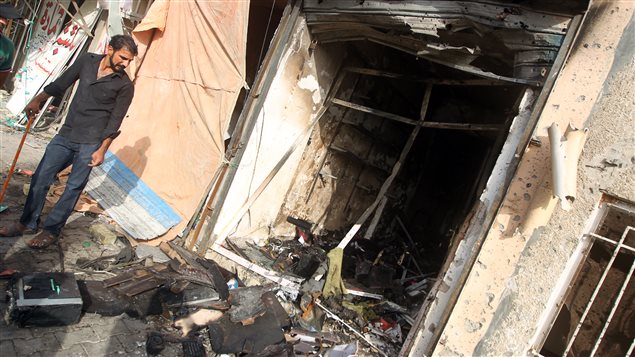 أضرار ناجمة عن انفجار سيارة مفخخة في بغداد