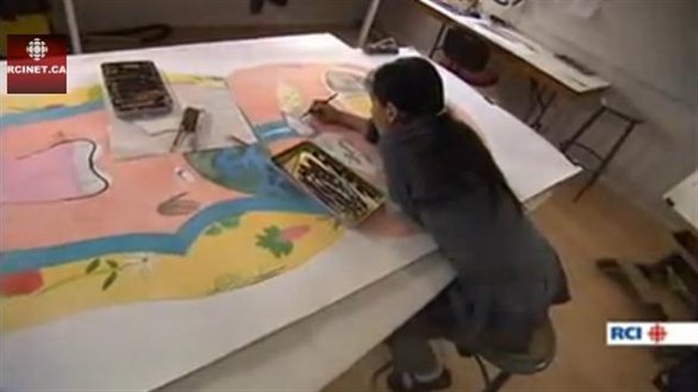 Shuvinai Ashoona, an Inuk artist from Canada's eastern Arctic territory of Nunavut, works on Untitled (Pink Amauti Hood) in 2010. The work is currently part of the Sakahan exhibit at the National Gallery of Canada. 