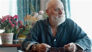 Earl Looker, a patient at the Riverview Health Centre, sits in his room staring out a window in Winnipeg in 2004. Dying is a natural part of the human condition, but dying badly isn't, says world-renowned palliative care expert Dr. Harvey Chochinov.