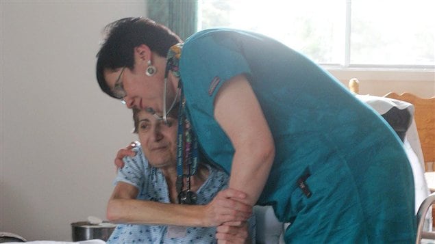 Dr. Anna Taube in hospital greys hugs cancer patieMaggie Halabi after a housecall in Edmonton in 2003. Only about 30 per cent of Canadians have access to quality palliative care Maggie Halabi after a housecall in Edmonton in 2003. Only about 30 per cent of Canadians have access to quality palliative care.