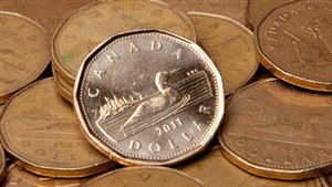 Le dollar canadien au plus bas depuis plus de trois ans