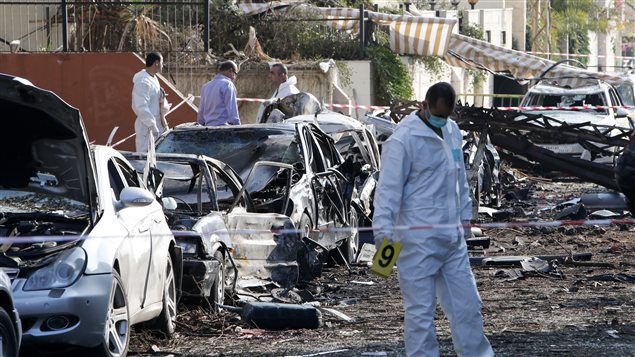 Le double attentat a soufflé la façade de 4 immeubles en plus de calciner des dizaines de voitures.