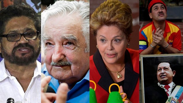 Iván Márquez, vocero de las FARC en el proceso con  el gobierno colombiano, José "Pepe" Mujica presidente de Uruguay, Dilma Rousseff presidente de Brasil, un partidario de Hugo Chávez con la foto del líder fallecido.  