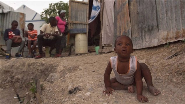 Niño en un campo de refugiados en Puerto Príncipe, cuatro años después del temblor. 