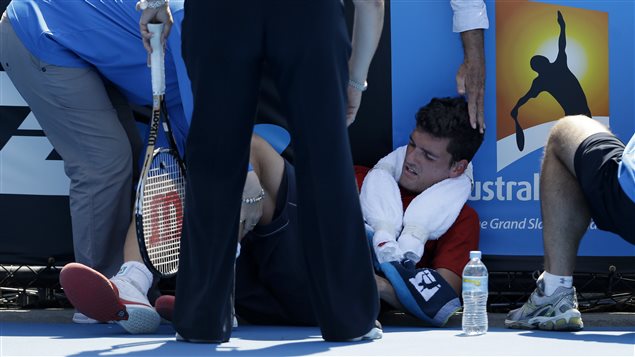 Le Canadien Frank Dancevic s'est effondré sur le court, victime d'un coup de chaleur.