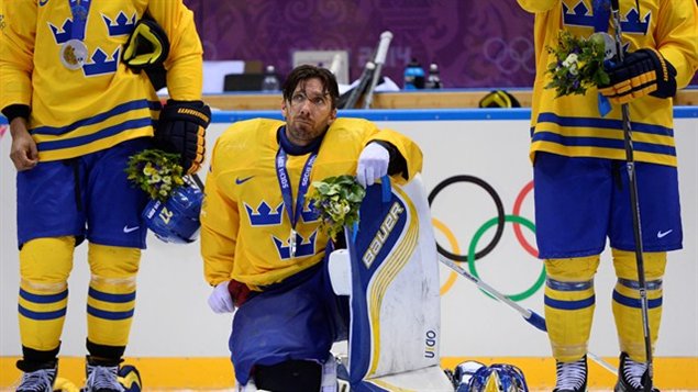 La déception se lisait dans le visage du gardien de but Suédois Henrik Lundqvist avec la médaille d'argent au cou.