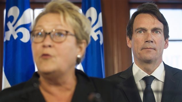 Pierre Karl Péladeau aux côtés de la chef du Parti Québécois Pauline Marois, lundi. 