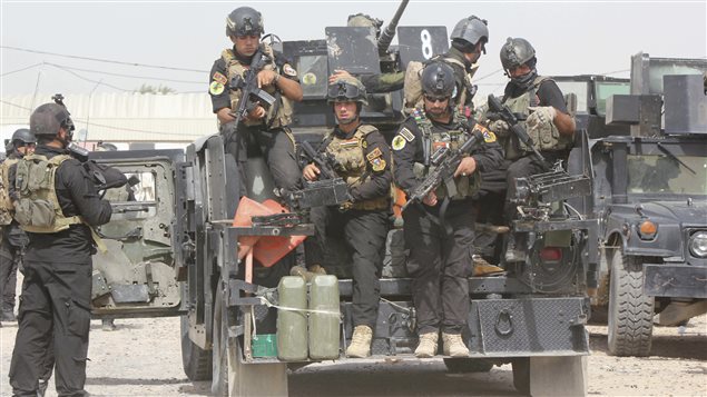 Des soldats irakiens à Bagdad, qui tentent de combattre les insurgés islamistes de l'État islamique en Irak et au Levant (EIIL).