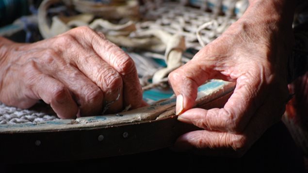 Alzheimer's disease is leaving more and more people adrift, but researchers in Montreal say they've taken another step in the medical battle against the disease. The photo shows a pair of elderly hands embroidering.