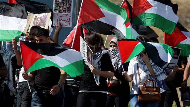  فلسطينيون يتظاهرون في نابلس احتجاجا على العمليّة الاسرائيليّة في غزّة في 16-تموز يوليو 2014