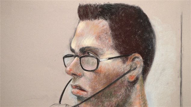 Luka Magnotta is shown in an artist's sketch in a Montreal court in March, 2013.  The shot shows him in left profile. He has a short brush cut and black hair and is wearing glasses resting slightly down on his nose. A headphone attached to a wire is attached to left ear. He has prominent lips that are drooping down in the picture and has fairly dark facial skin. 