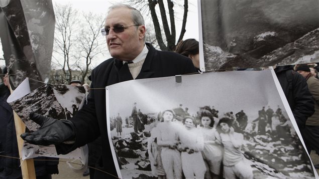 Un fil de discussion en mémoire des millions de victimes des nazis - Page 8 140729_8n8ak_efraim-zuroff_sn635