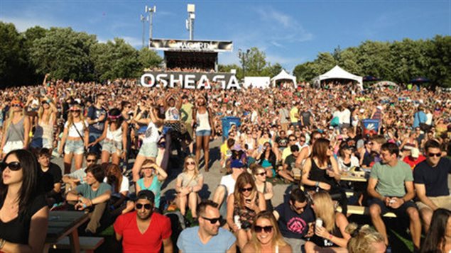 It was three days of fun at Montreal music festival. It's a bright, beautiful day under a blue sky. We see thousands of young people in front of a stage. At their back is another stage that has "Osheaga" written in giant white letters.