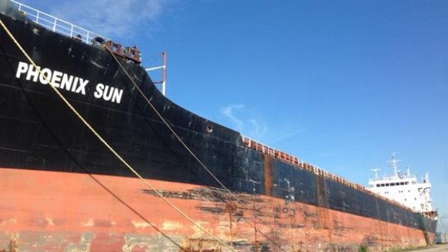 The 186-metre rusting freighter has been docked for two years. Residents recently initiated a petition to have it removed.